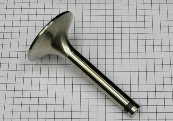 Фото добойника из клапана автомобильного двигателя